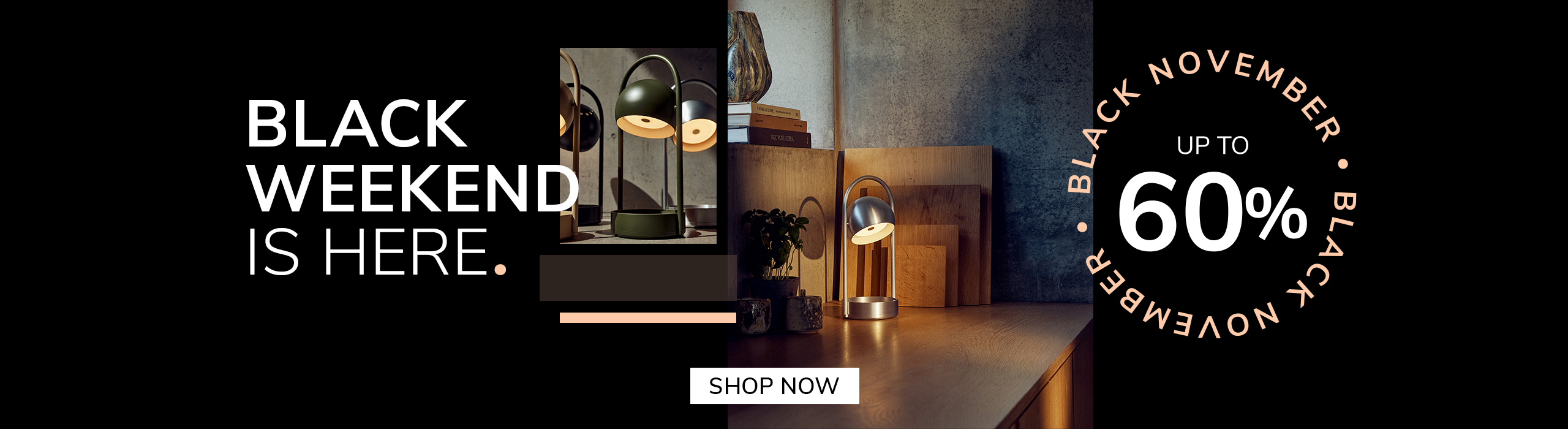 Save now “Modern silver table lamp glowing on a wooden desk with cutting boards and plants in the background. Promotional text reads: ‘Black Weekend is here. Up to 60%. Black November.’ A button says ‘Save Now.
