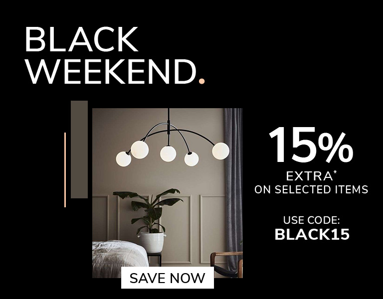 Save now A modern interior scene featuring a decorative wooden floor lamp glowing warmly beside a beige sofa. On the right, bold promotional text reads “Black Savings. Now 13% Extra on Selected Items. Use code: BLACK13,” with a button saying “Save Now.” The design